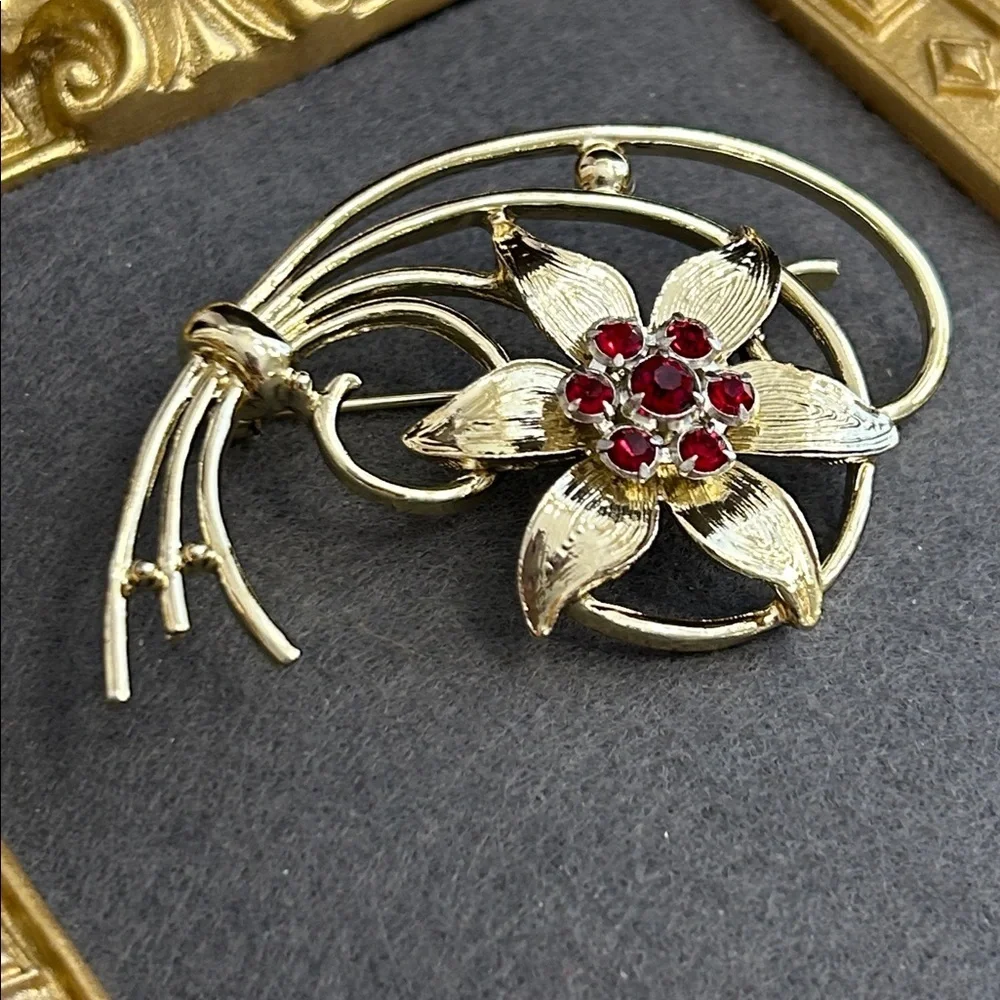 Gold-Tone Floral Brooch with Red Crystal Accents